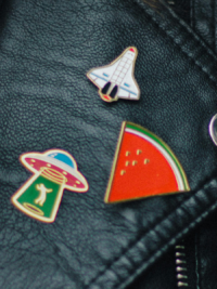 close-up of enamel pins